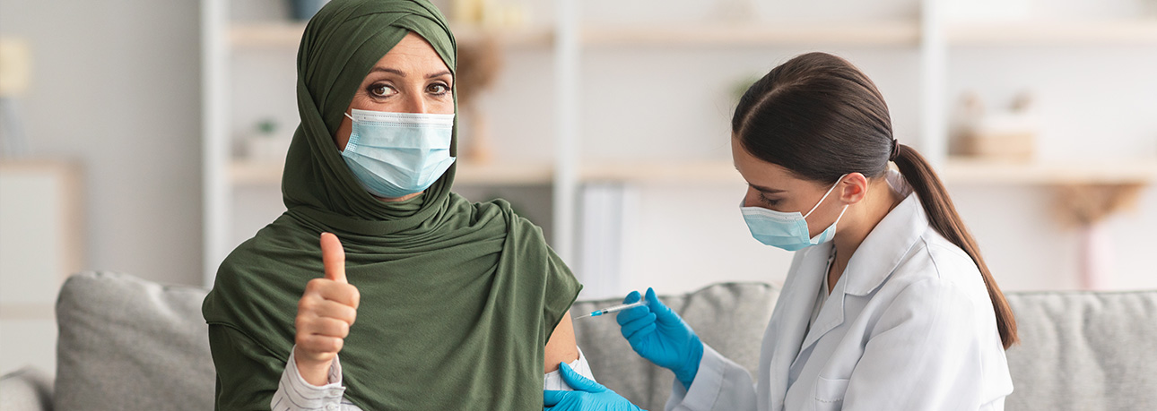Pharmacist caring for a patient at Higher Crumpsall Pharmacy
