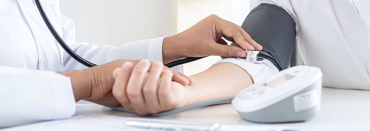 Blood pressure being measured at Higher Crumpsall Pharmacy