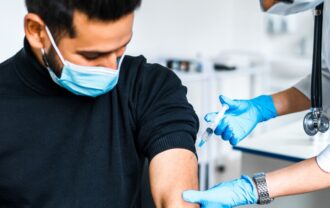 NHS travel vaccination Manchester