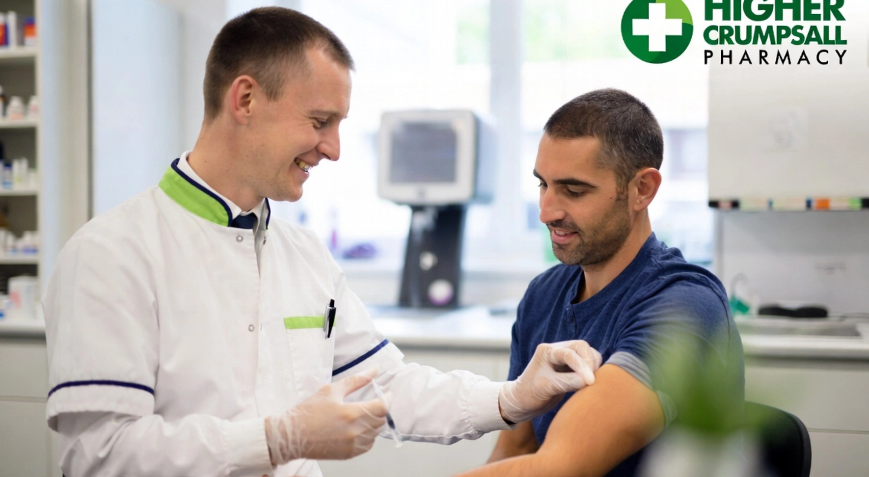 Patient receiving a flu vaccination at a community pharmacy.